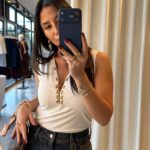 White Sleeveless Top With Gold Button Detail