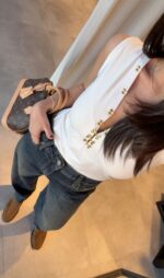 White Sleeveless Top With Gold Button Detail - Image 3