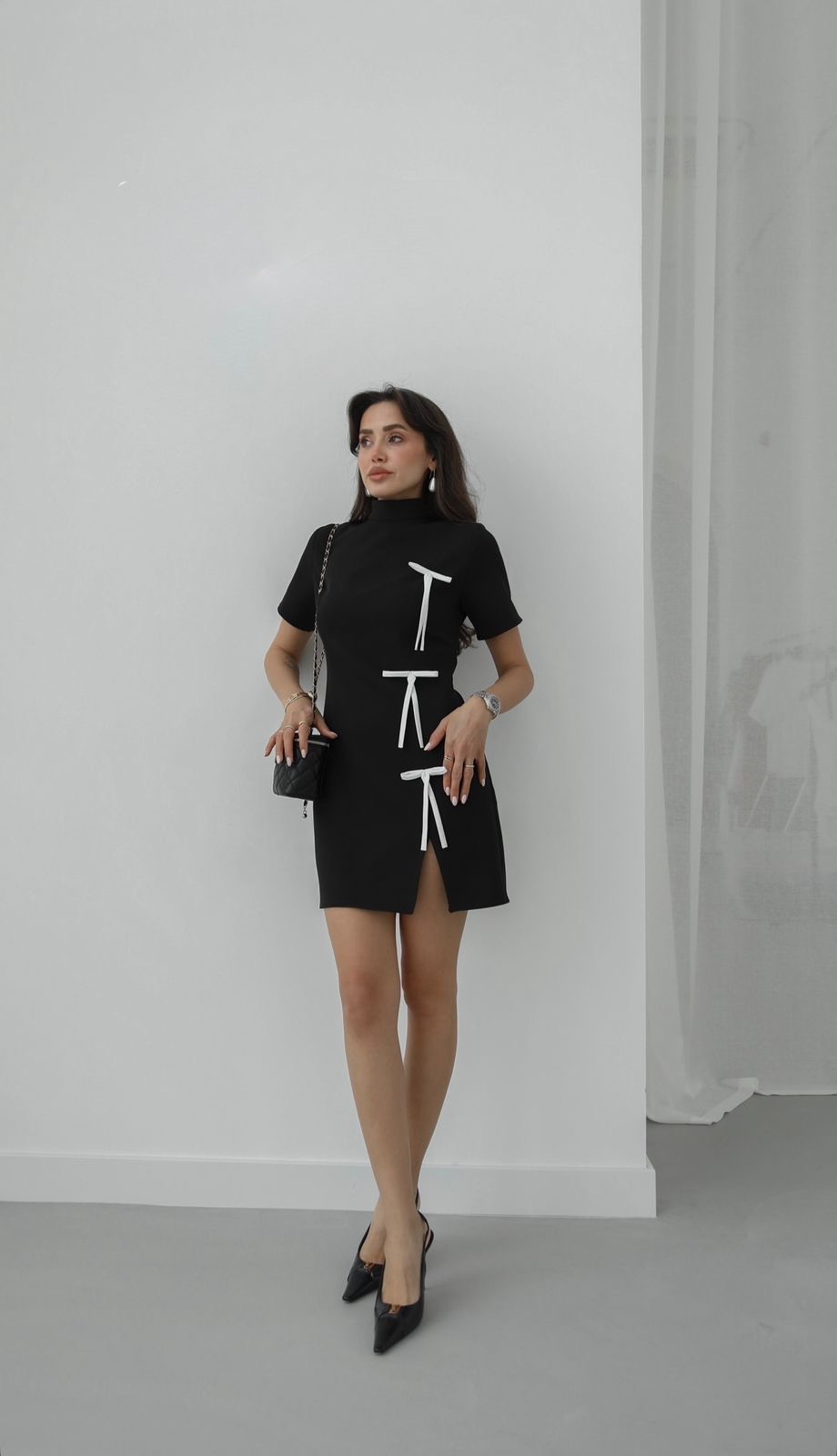 0361af6e-7597-4a4a-bd53-113355245a66 Black Mini Dress With Bows - Image 1