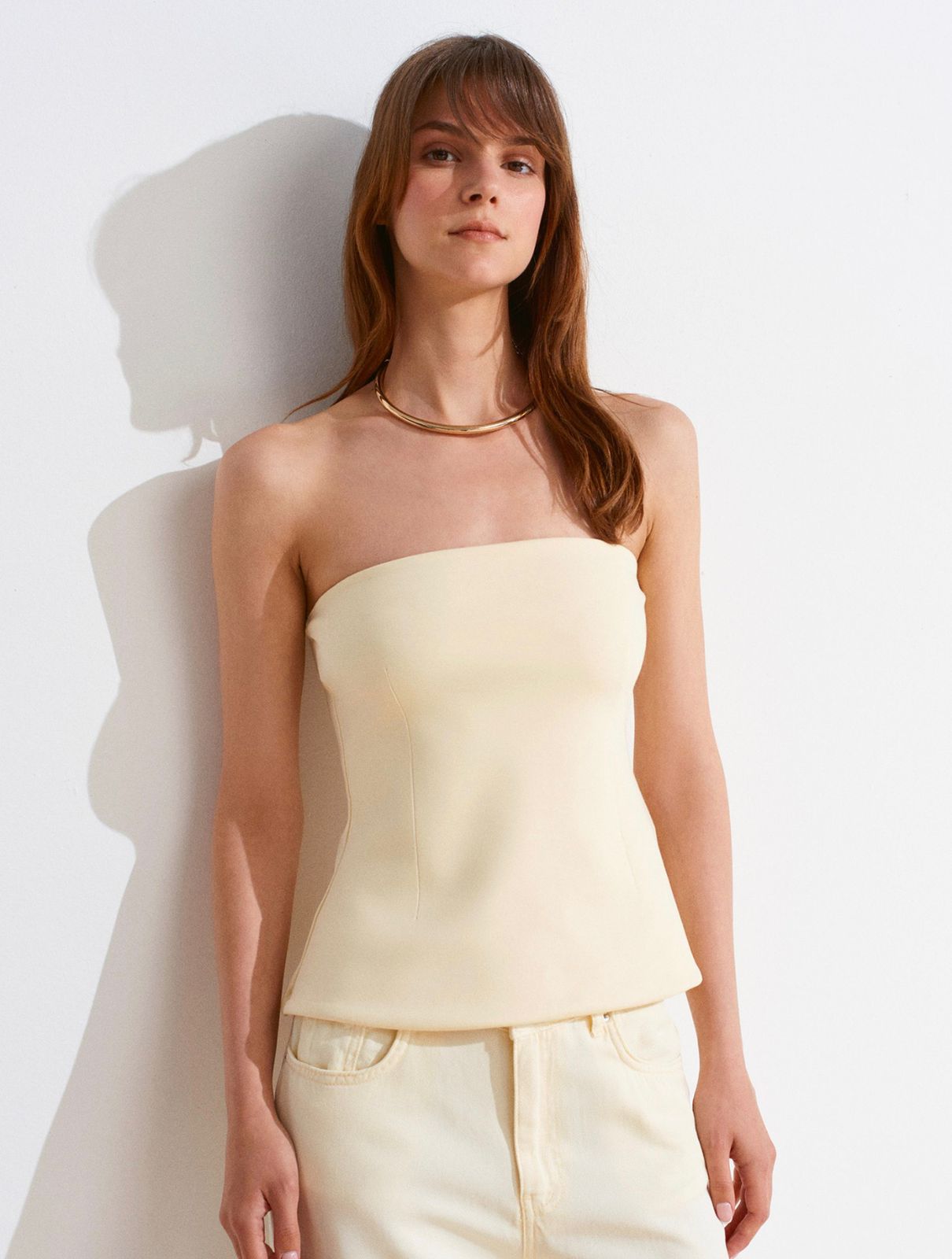 79470316-0541-4ae8-83df-573870e81f7d.jpg Butter Yellow Strapless Tube Top - Image 1