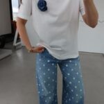 White T-Shirt With Blue Flower Brooch