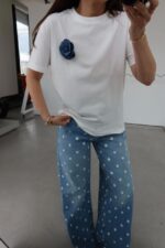 White T-Shirt With Blue Flower Brooch
