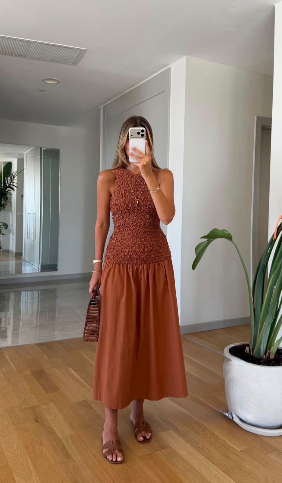 9113c77e-d441-4237-88a2-b075dcf5737c Rust Sleeveless Smocked Midi Dress - Image 1