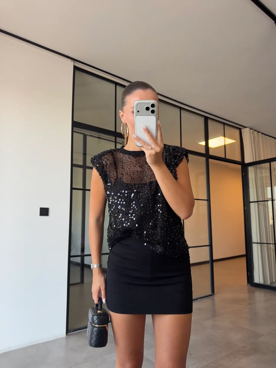 87fe3c93-5328-4c11-b281-ba8f7cd00aea Black Sequin Sheer Sleeveless Top - Image 1