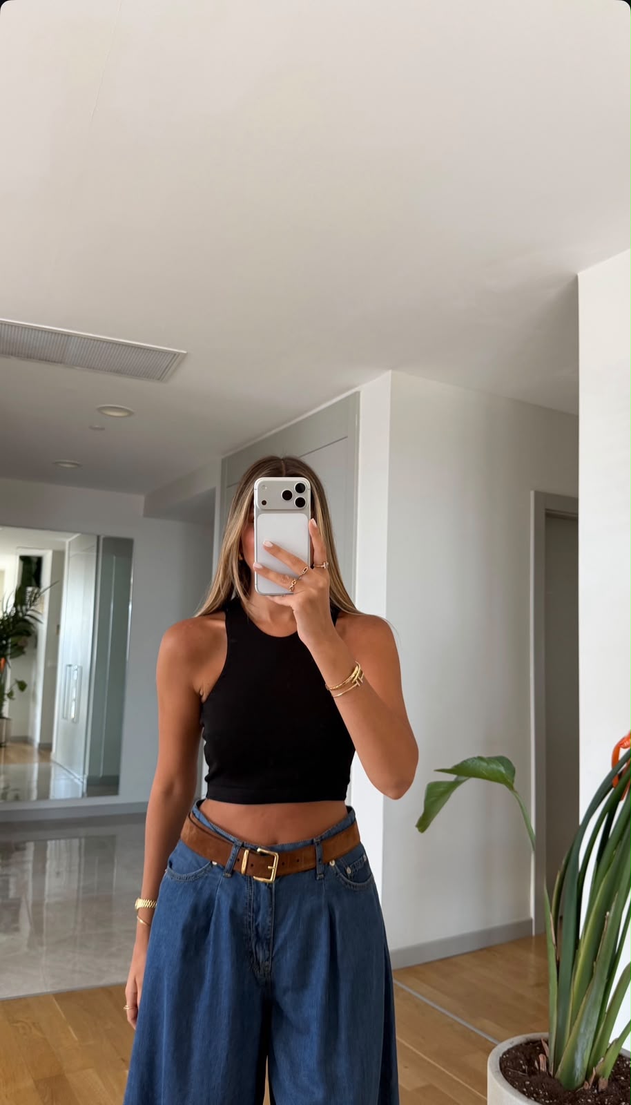 ce1a3a1a-5853-4d5a-9225-b8c0720924c9 Black Sleeveless Crop Top - Image 1