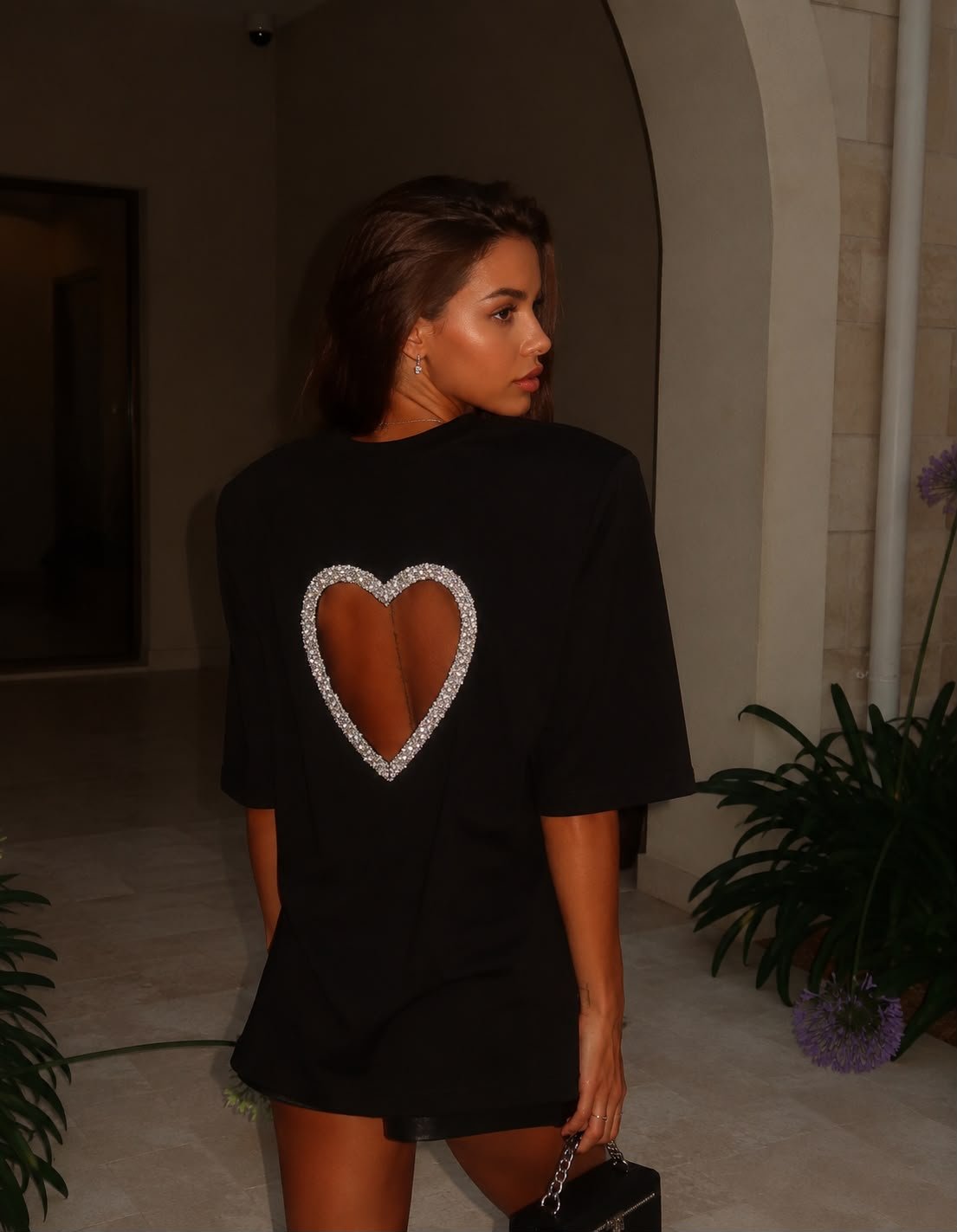 e6278e8c-91a5-4104-a699-c915b34f2e0d Black T-Shirt Dress With Heart Cutout Back - Image 1